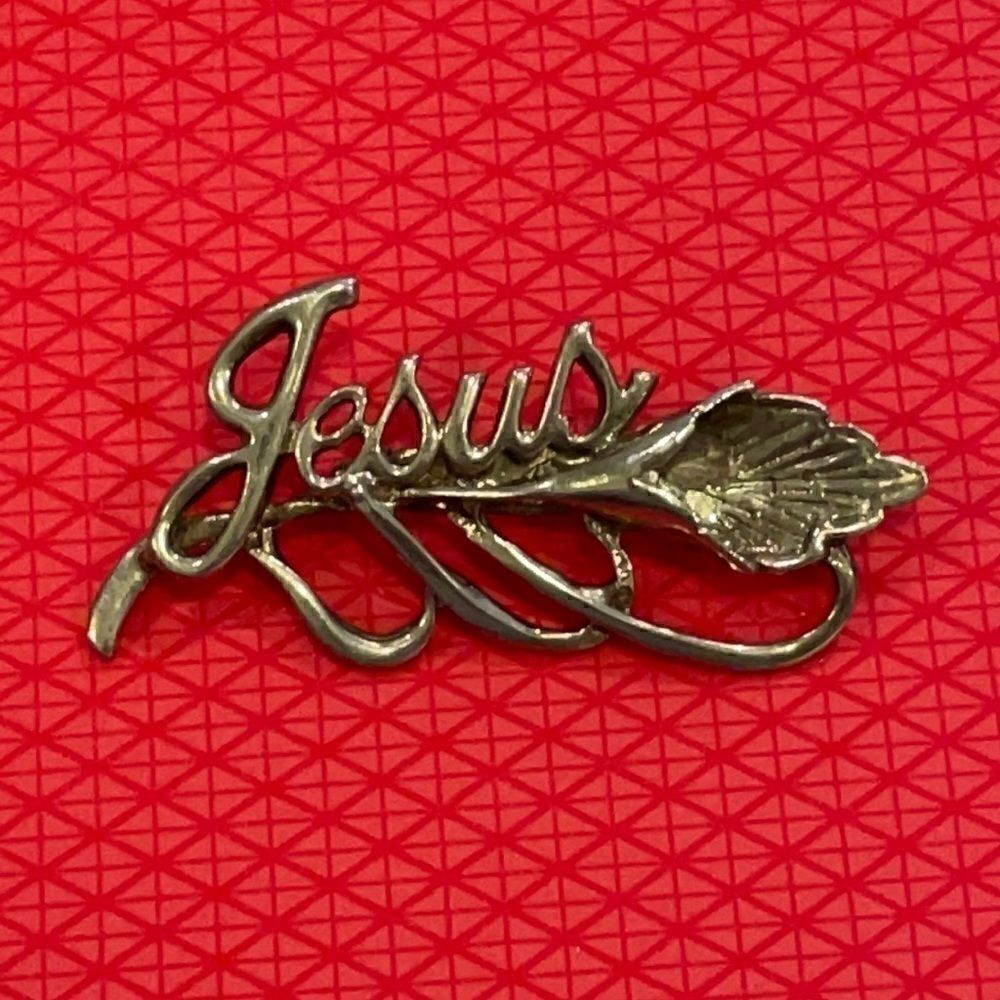 Vintage signed BSK Jesus flower silver-tone brooch